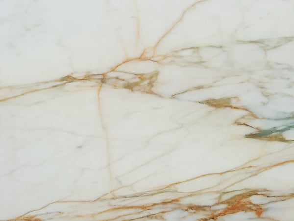 Calacatta Oro marble slab background white and gold malta