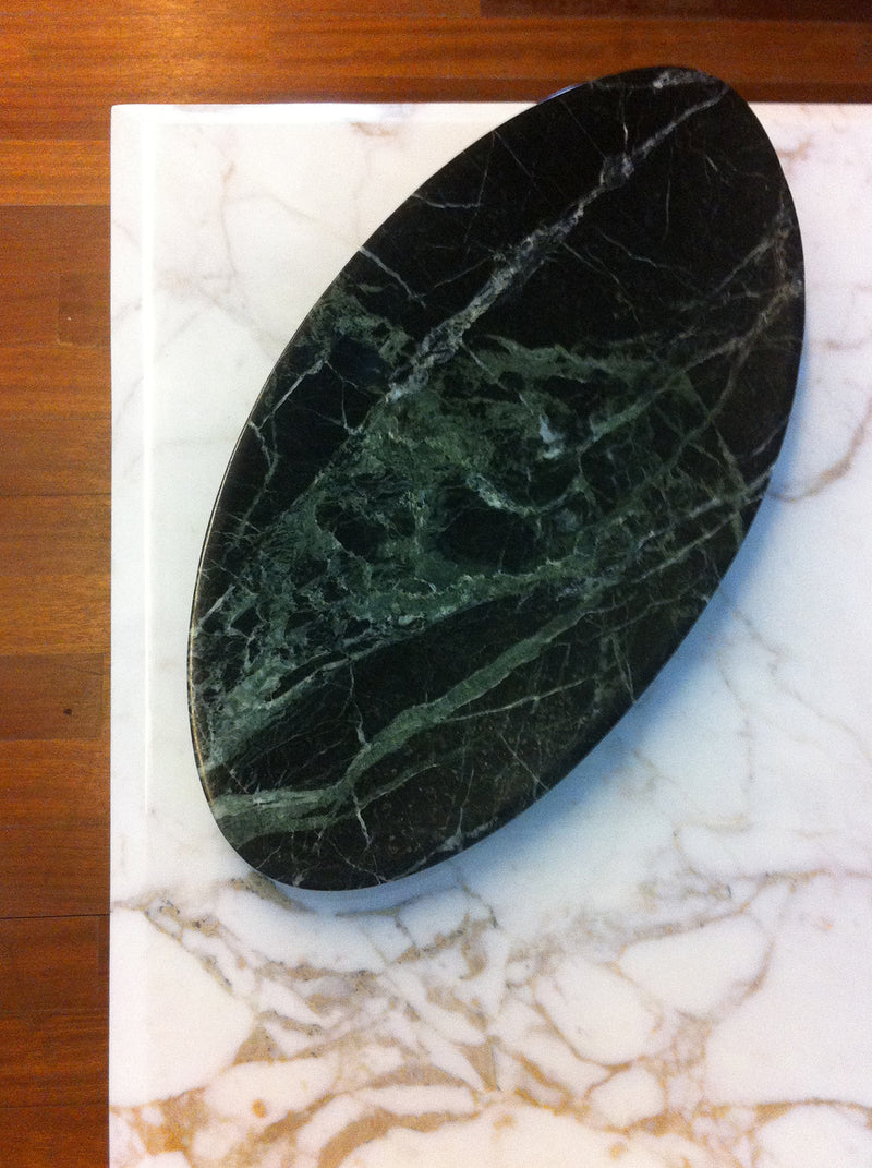 dark green and black marble object