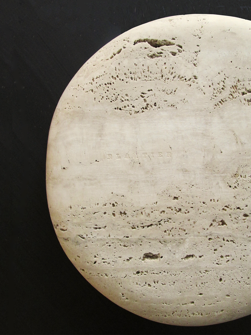 travertine plate black background