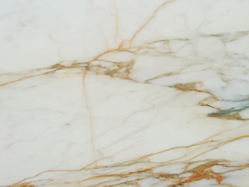 Calacatta Oro marble slab background white and gold malta