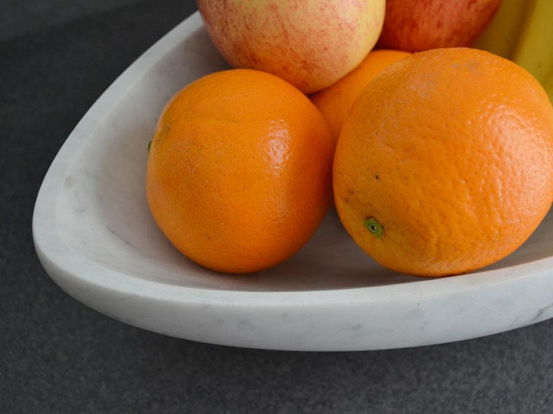 fruit bowl oranges close up bianco carrara